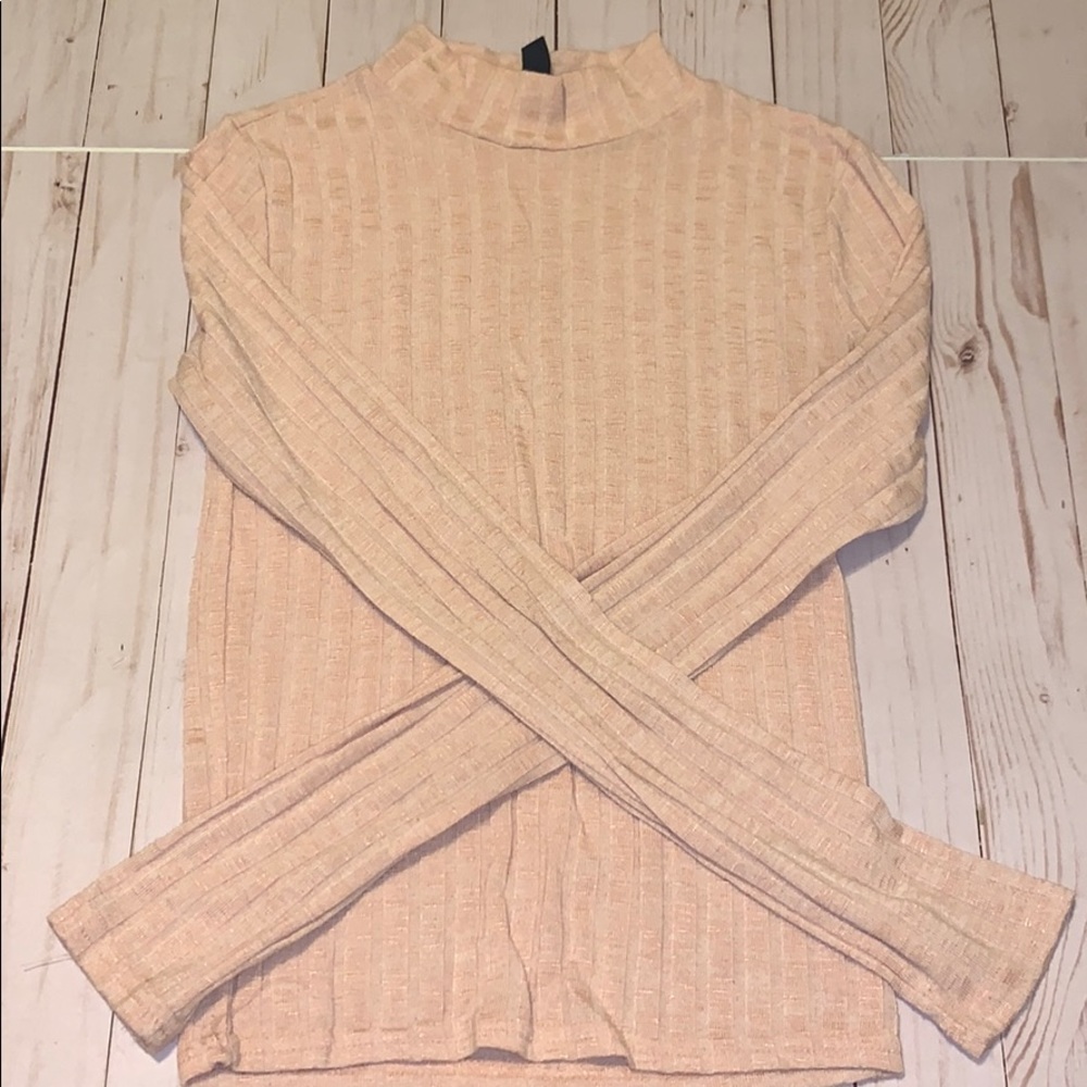 Light pink turtleneck top
